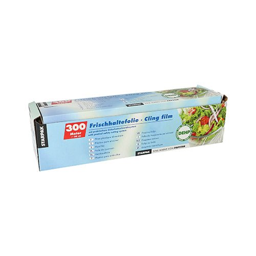Starpak plastfolie, PVC 300 m med praktiskt skärsystem, levereras i en blå låda med texten „Cling film“. Förpackningen visar en salladsskål och har ett integrerat skärsystem för enkel skärning.