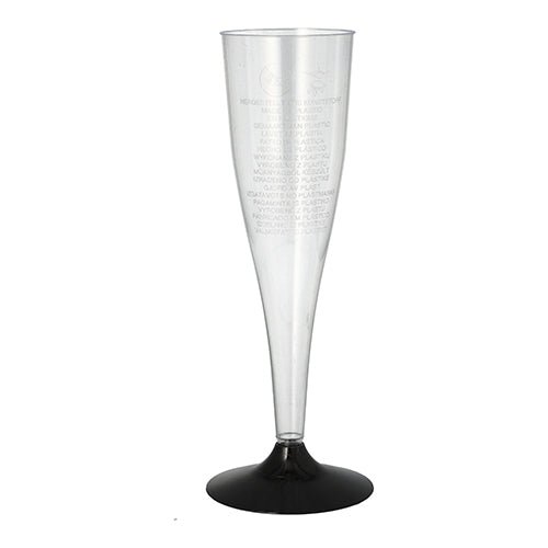 Ett kristallklart Starpak-sektglas (PS, 0,1 l, Ø 5 cm, 17,5 cm) med svart fot står framför en vit bakgrund. Krympfolie-förpackning (5 stycken). Perfekt för festliga tillfällen.