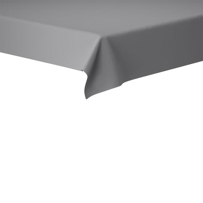 En närbild visar hörnet av ett rektangulärt bord täckt med en enfärgad grå Evolin-bordsduk 127 x 127 cm från Duni GmbH, där både bordskanten och tyget är tydligt synliga.