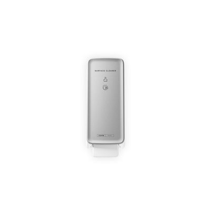CWS PureLine Frontpanel för Surface Cleaner Toilette är en silverfärgad, väggmonterad dispenser med synlig tryckspak, minimala textinstruktioner och modern design, avbildad mot en vit bakgrund.