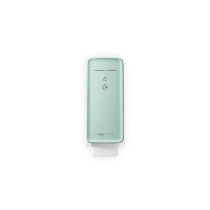 CWS PureLine Frontpanel för ytrengöraren Toilette från CWS är en ljusgrön, väggmonterad dispenser med modern design, en tryckspak på undersidan och enkel svart text/symbolik som står ut från en enkel vit bakgrund.
