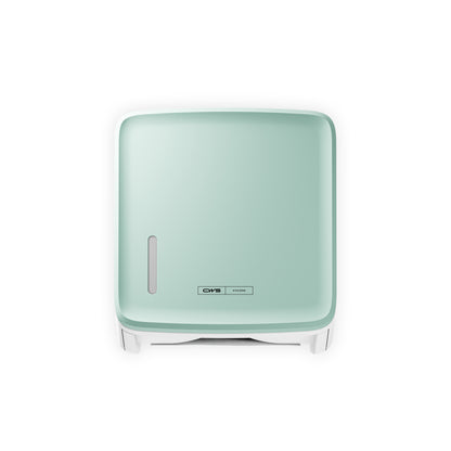 Ein quadratisches, an der Wand montiertes mintgrünes CWS PureLine Frontpanel für den Paper Spender von CWS verfügt über ein kleines ovales Fenster und ein CMS-Logo auf der Vorderseite, das vor einem weißen Hintergrund dargestellt ist.