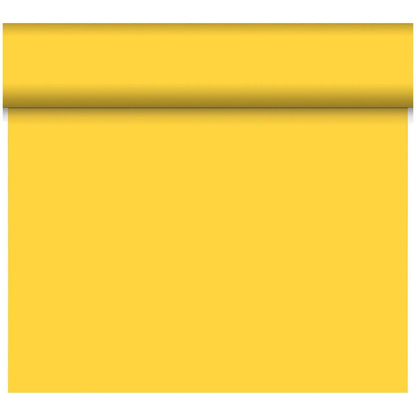 En delvis utrullad Dunicel-bordslöpare Tête-à-Tête 24 m x 0,4 m (20 sektioner) från Duni GmbH kastar en mjuk skugga på sin släta, jämnt färgade yta - perfekt för en stilfull bordsdekoration vid din nästa tête-à-tête.