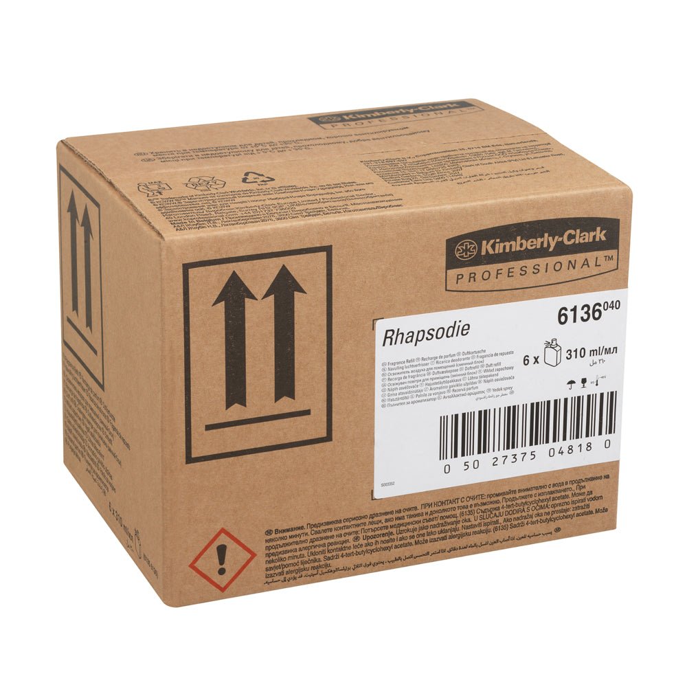 En brun kartong med texten "Kimberly-Clark Professional™ doft RHAPSODIE - påfyllningsförpackning/Transparent/310 ml - 6 kassetter" från Kimberly-Clark GmbH, idealisk för tvättrumsluftfräschare eller toalettluftspridare, med produktinformation och varningssymboler.