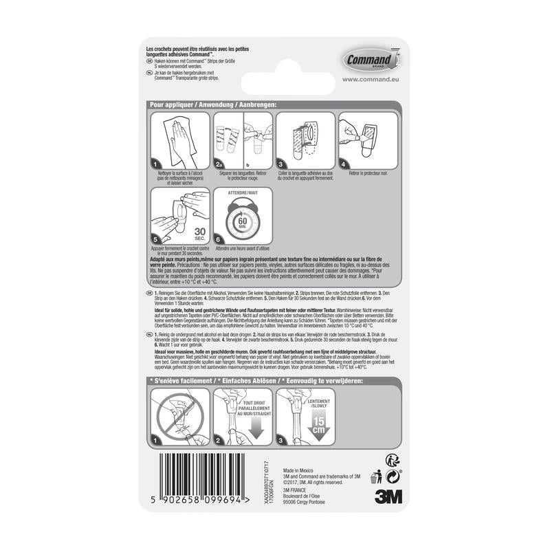 Baksidan av en 3M Deutschland GmbH Command™ Mini-krok, 17006-förpackning med flerspråkig instruktion, diagram för verktygslös montering, användning av klisterremsor, varningar, produktdetaljer, streckkod - kan tas bort utan rester.