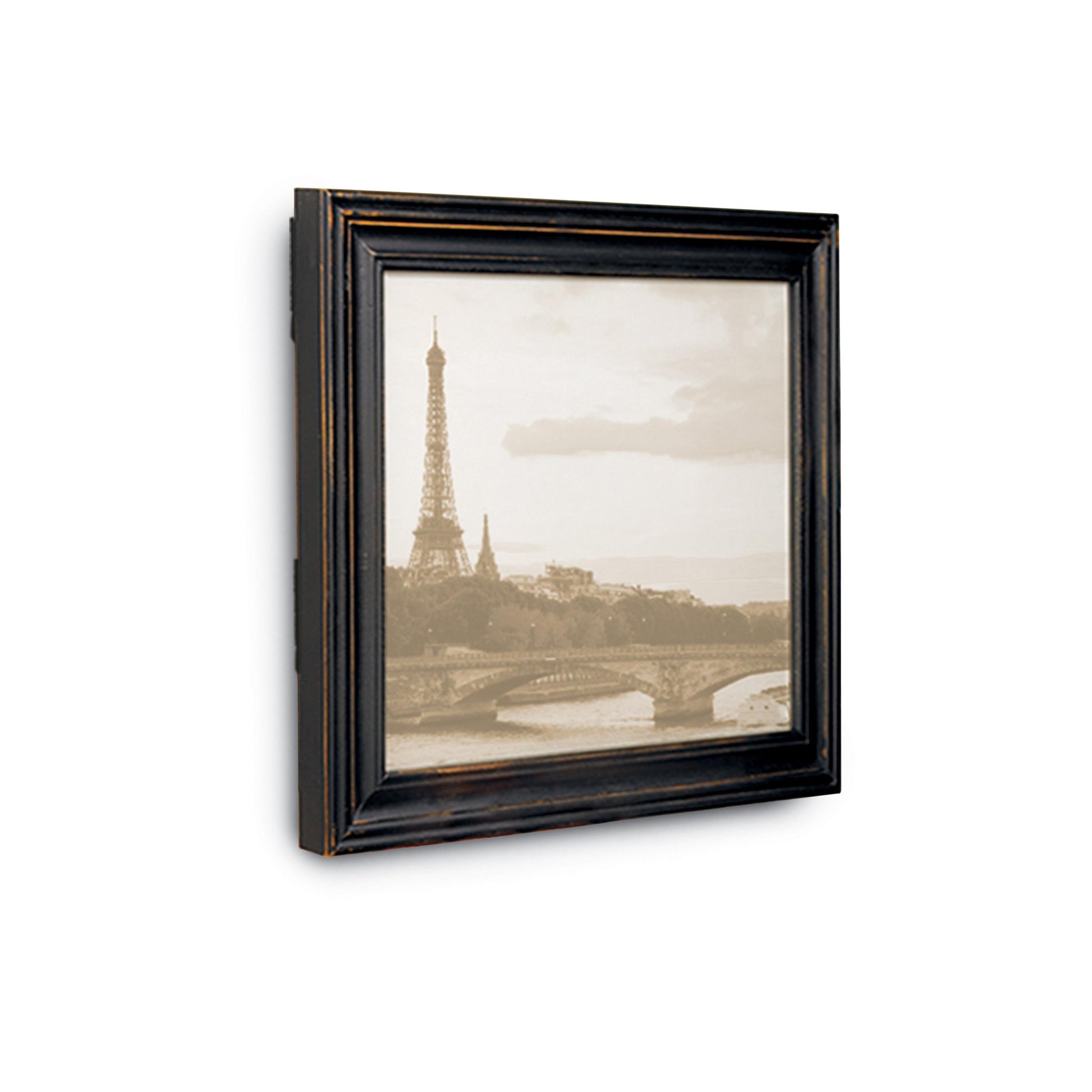 Ein gerahmtes Schwarz-Weiß-Foto des Eiffelturms mit Brücke und Fluss lässt sich mit den 3M Deutschland GmbH Mittelgroße schwarze Command™ Bilder-Montage Strips M 17201BLK ganz einfach an der Wand anbringen - ganz ohne Nägel.