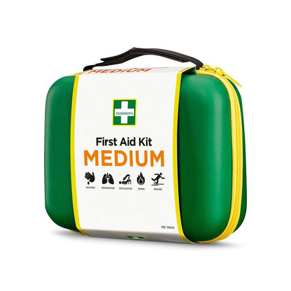 En kompakt Första hjälpen-låda MEDIUM från Orkla Wound Care AB i grönt och gult, med symboler för sår, andning, cirkulation, brännskador och stukningar - perfekt som snabb nödfallsutrustning.