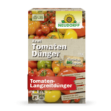 En rektangulär låda Azet Tomatgödsel från Neudorff Shop med tomatbilder, varumärke och tysk text understryker den organiska formeln för långsiktig gödsling och rik tomatskörd.