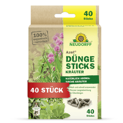 En låda Neudorff Shop Azet gödningspinnar för örter innehåller 40 gödningspinnar för aromatiska örter. Den grön-beige förpackningen med tysk text ger näring åt örter odlade i krukjord.
