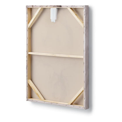 Bilden visar baksidan av en rektangulär spänd duk med träram och förstärkta hörn, där en vit Command™ Canvas Hängare från 3M Deutschland GmbH är fäst upptill.