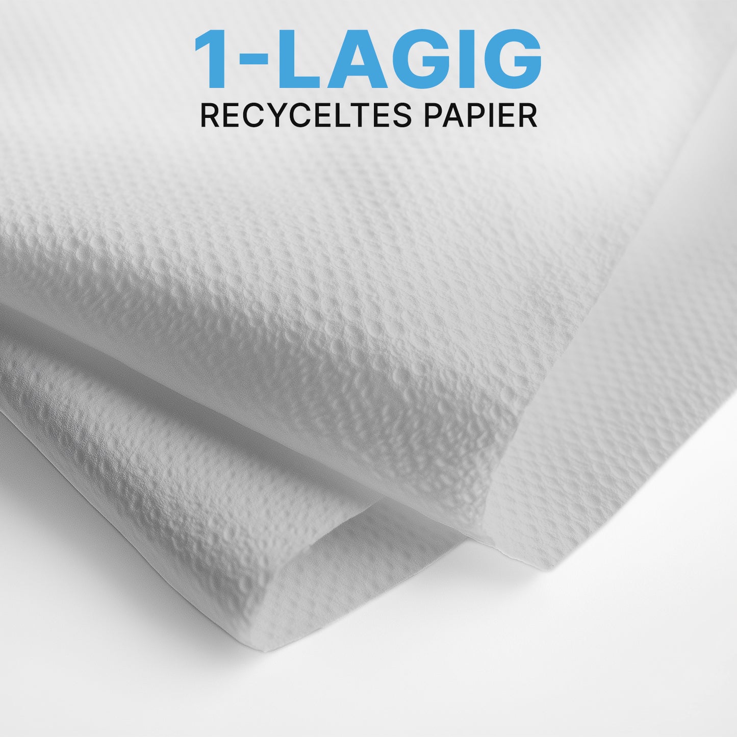 Närbild av två vita ARNOMED PAPPERHANDDUKAR (25 x 23 cm, V-FALZ) från ARNOWA GmbH med strukturerad yta, staplade i V-falz. Den blå-svarta texten lyder "1-LAGERS ÅTERVUNNET PAPPPER" - idealiskt för tvättrum.