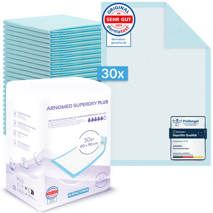 En förpackning med 30 ARNOMED SUPERDRY PLUS extra absorberande sänginlägg (ARNOWA GmbH), var och en 60x90 cm med SAP, ofällda och förseglade för dermatest och kvalitet visad. Superabsorberaren säkerställer en effektiv inkontinensvård.