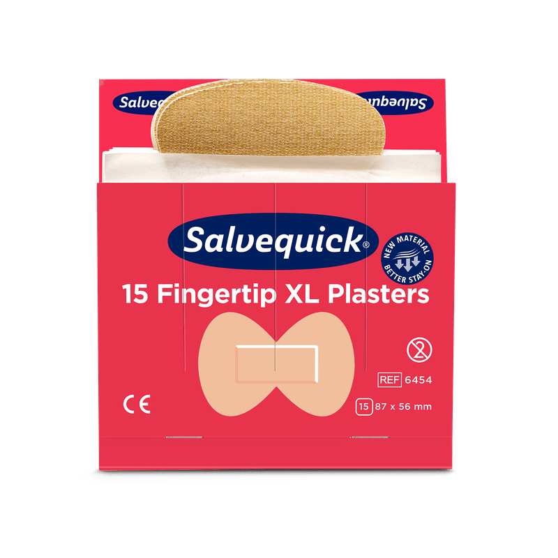 En röd ask Orkla Wound Care AB XL Fingerspets Textilplåster, 15 stycken/min (6 stycken förpackning), med ett delvis avlägsnat plåster. Förpackningen visar CE-märket, dimensionerna och en bild av fingerspetsformen.