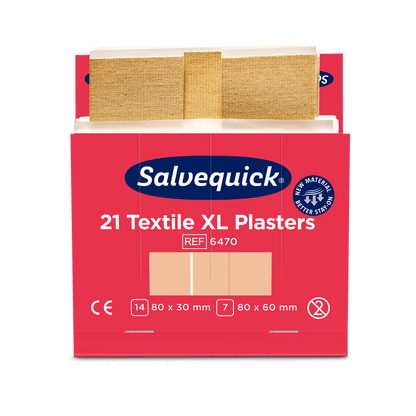 En röd-vit låda med texten "Orkla Wound Care AB Xl textilgips, 21 stycken/mina | Förpackning (6 stycken)" med två beige textilplåster i storlekarna 80 x 30 mm och 80 x 60 mm samt produkt- och certifieringsuppgifter.