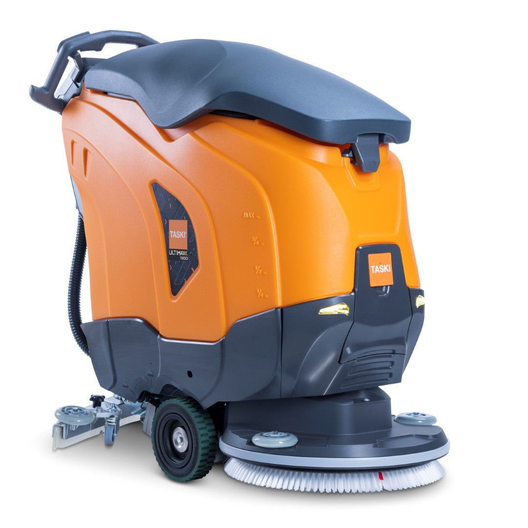 Den TASKI ULTIMAXX 1900 SD50 Performance BMS 40A från Diversey Deutschland är en orange-grå skurmaskin med hjuldrift, 43L tank, 50cm enkelskiva, hjul, slangfäste och övermonterade reglage.