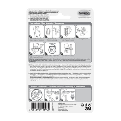 Die Rückseite einer Command™ Besenhalter, 17007-FR-Verpackung der 3M Deutschland GmbH zeigt eine bebilderte, mehrsprachige Anleitung zum Anbringen und Entfernen des Halters mit Command Klebestreifen. Diagramme führen Schritt für Schritt durch die Montage und Demontage.