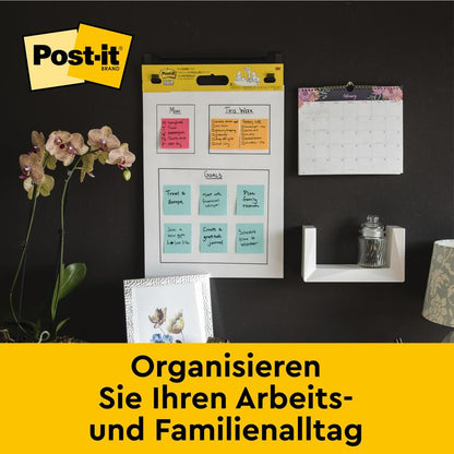 En kontorsvägg med ett Post-it® Super Sticky självhäftande mötesblock från 3M Deutschland GmbH (58,4 x 50,8 cm), idealisk för snabba möten och organisation i vardagen. Innehåller 6 block à 20 blad, PEFC-certifierad.