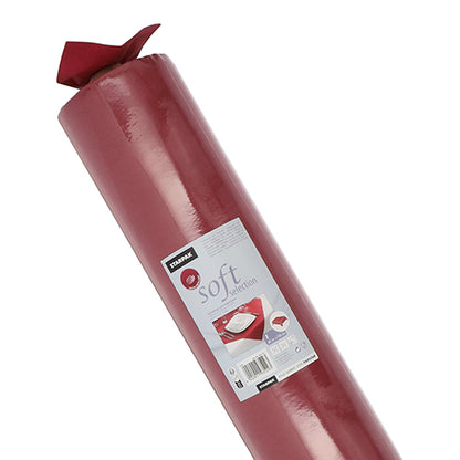 En stor rulle Starpak-bordsduk, tygliknande fleece "Soft Selection", är försedd med en etikett med streckkod, märkesnamnet Starpak och en bild av den använda bordsduken.