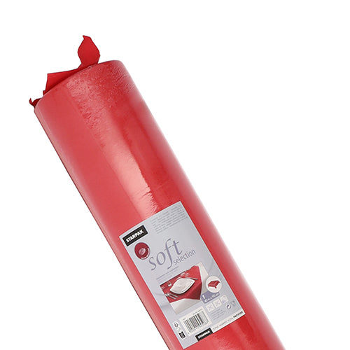 En rulle röd Starpak-bordsduk, tyg-liknande fleece "Soft Selection", är lätt snedställd på vit bakgrund. Förpackningen visar varumärket Starpak samt produktdetaljer och framhäver den tyg-liknande texturen.