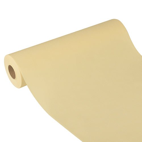 Starpak-bordslöparen, tyg-liknande, fleece "Soft Selection Plus" (24 m x 40 cm) i ljusbeige ligger delvis utrullad på vit bakgrund och framhäver dess släta textur och eleganta utseende – idealisk för speciella tillfällen.