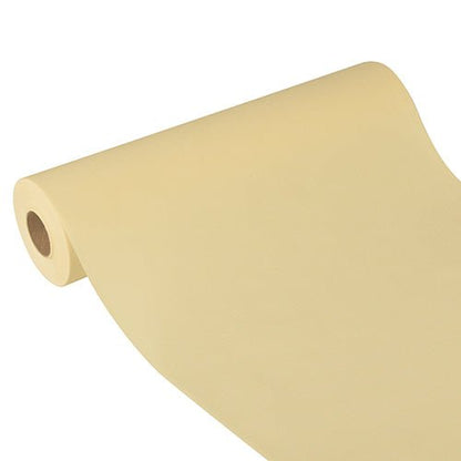 Starpak-bordslöparen, tyg-liknande, fleece "Soft Selection Plus" (24 m x 40 cm) i ljusbeige ligger delvis utrullad på vit bakgrund och framhäver dess släta textur och eleganta utseende – idealisk för speciella tillfällen.