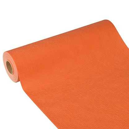 Starpak-bordslöparen "Soft Selection Plus" av tyg-liknande fleece (24 m x 40 cm) är delvis utrullad, visar struktur och cylindrisk form – idealisk som stilfull bordslöpare för speciella tillfällen.