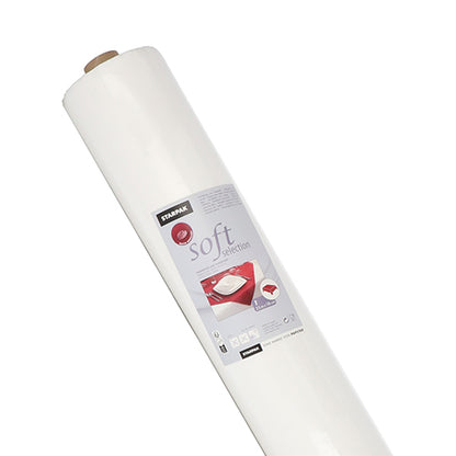 Avbildad är en stor rulle Starpak bordsduk, tygliknande, fleece "soft selection" (25 m x 1,18 m, vit) med en etikett med kuddsymbol och produktdetaljer, fotograferad mot en enkel vit bakgrund.