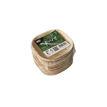 En stapel kvadratiska PAPSTAR 25 tallrikar av palmblad ("pure") från PAPSTAR GmbH, miljövänligt tillverkade, förpackade i plast och försedda med grön-vit etikett med produktinformation.