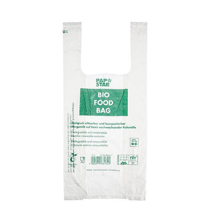 En transparent biofoliepåse med texten "BIO FOOD BAG" med grön text från PAPSTAR GmbH. Denna miljövänliga skjortbärväska är biologiskt nedbrytbar, komposterbar och kommer som en rulle med 100 knutpåsar.