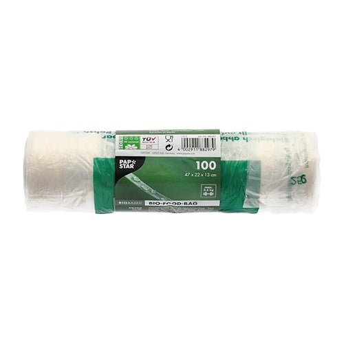 PAPSTAR GmbH 100 skjortbärväskor av transparent biofolie (47x22x13 cm) på rulle är miljövänliga knutpåsar och idealiska för daglig användning, praktiskt förpackade med grön-vita etiketter.