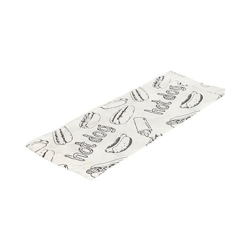 Avbildad är en platt, vit PAPSTAR korvbrödspappersförpackning (21x8,5 cm) med svart korvbrödsritning och texten "Hot Dog" från 1000-pack från PAPSTAR GmbH på vit bakgrund.