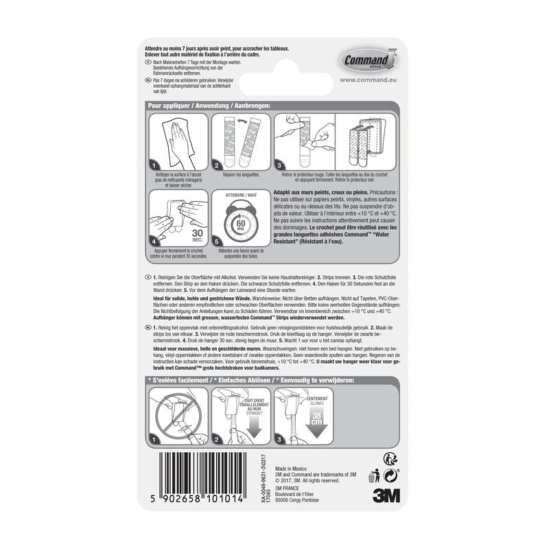 Baksidan av förpackningen för Command™ Canvas Hängare från 3M Deutschland GmbH med streckkod, produktdetaljer, 3M-logotyp och illustrerade instruktioner på franska, tyska och nederländska för att applicera och ta bort klisterremsor.