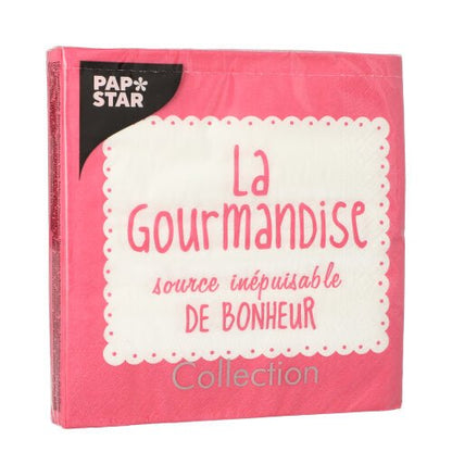 En rosa förpackning PAPSTAR 20 servetter, 33x33 cm, 3-lagers, med vit vågig etikett med texten "La Gourmandise, source inépuisable de bonheur." Uppe till vänster står "PAP STAR", och nere står "Collection".