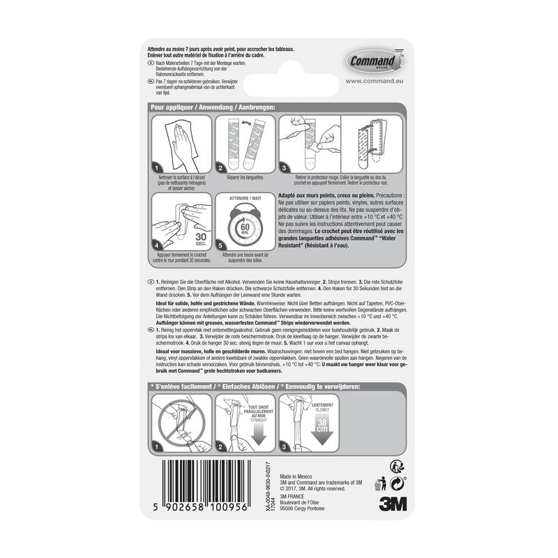 Baksidan av en förpackning med Command™ Canvas Hängare från 3M Deutschland GmbH innehåller en illustrerad bruks-/borttagningsanvisning på fyra språk, en streckkod längst ner, tillverkarens information och 3M-logotypen.