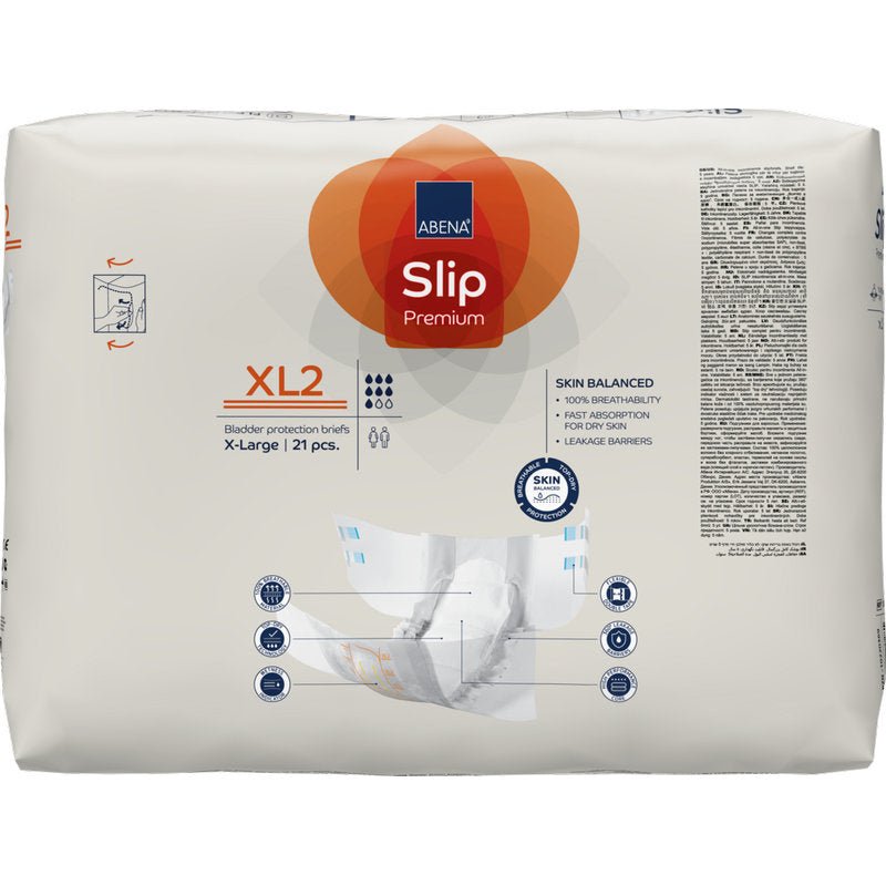 Ett paket ABENA Slip Premium från Abena Re-Seller GmbH, storlek XL2, innehåller 21 stycken i en beige förpackning med blå och orange accenter, produktdetaljer, en hand som håller en blöja och ikoner för inkontinensvård.