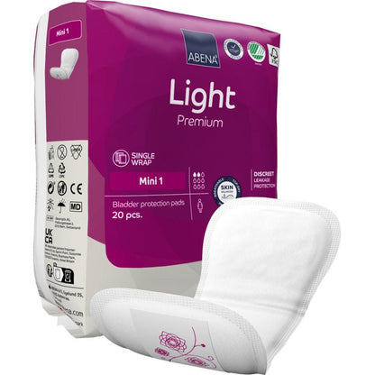 Ett paket ABENA Light Mini 1, Premium från Abena Re-Seller GmbH innehåller 20 pads för lätt inkontinens. Framsidan visar en pad. Den lila-vita förpackningen visar produktdetaljer och varumärkeslogotyper.