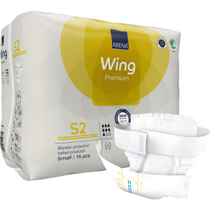 Eine Packung mit 15 ABENA Wing Premium S2 Gürtelwindeln für Erwachsene der Abena Re-Seller GmbH. Die gelb-weiße Verpackung zeigt Produktinfos, vorne eine ungefaltete Windel und hebt Schutz und Komfort als bewährte Inkontinenzprodukte hervor.