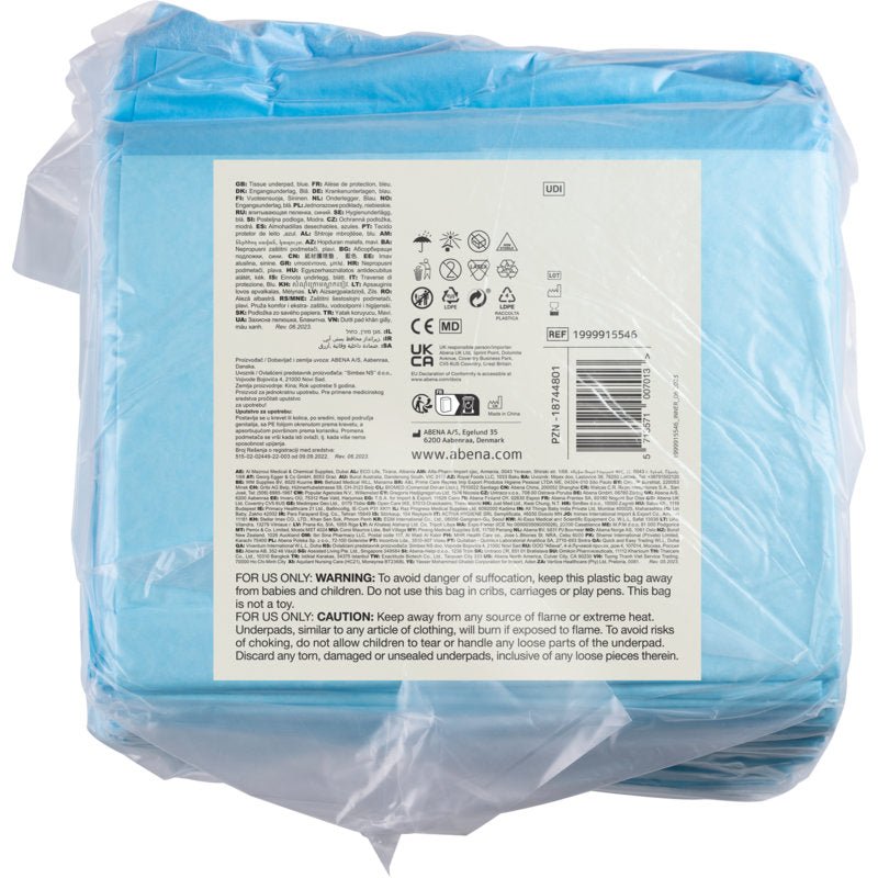 En genomskinlig plastförpackning från Abena Re-Seller GmbH innehåller 25 blåa, 6-lagers ABENA Tissue engångsunderlägg, 60x60 cm. Baketiketten visar produktinformation, symboler, streckkod och flerspråkiga varningar.
