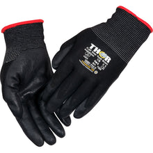 Ein Paar schwarze Thor Flex Winterhandschuhe mit strukturiertem Griff, rot eingefassten Stulpen und aufgedruckten Sicherheitszertifikaten auf der Rückseite von Abena Re-Seller GmbH.