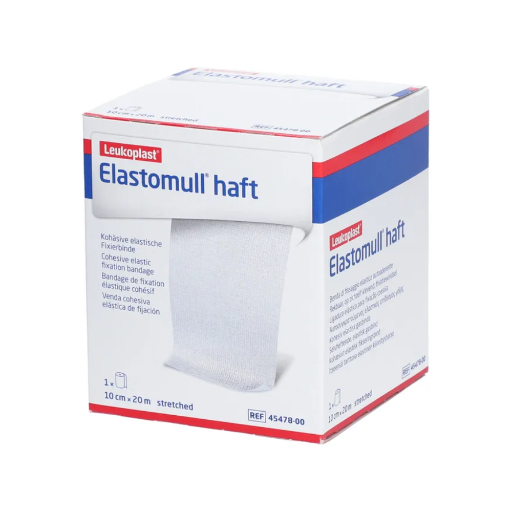 En låda BSN Elastomull® haft, ett elastiskt fixeringsband från BSN Medical GmbH. Lådan är övervägande vit med blå och röda accenter och visar produktdetaljer och specifikationer på framsidan.