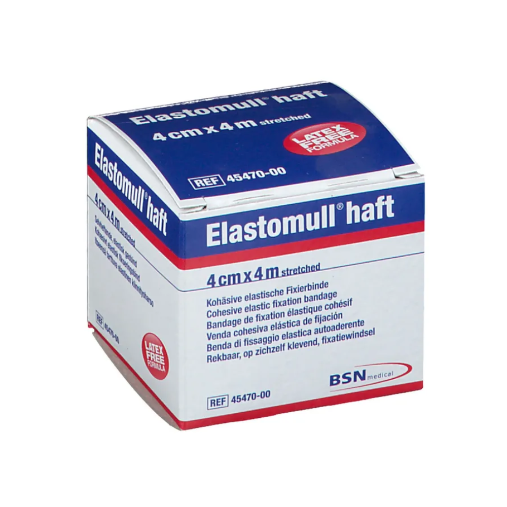 En låda BSN Elastomull® haft, ett elastiskt fixeringsband med latexfri polymer. Förpackningen är vit med blå och röd text, storleken anges som 4 cm x 4 m sträckt, etikett från BSN Medical GmbH.