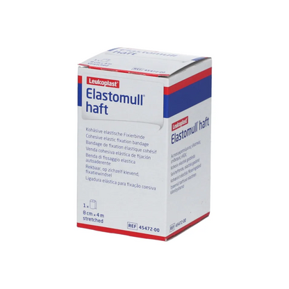 Utställd är en låda BSN Elastomull® haft, ett elastiskt fixeringsband från BSN Medical GmbH av latexfri polymer. Den övervägande vita förpackningen är försedd med röda och blå accenter och innehåller text på flera språk.