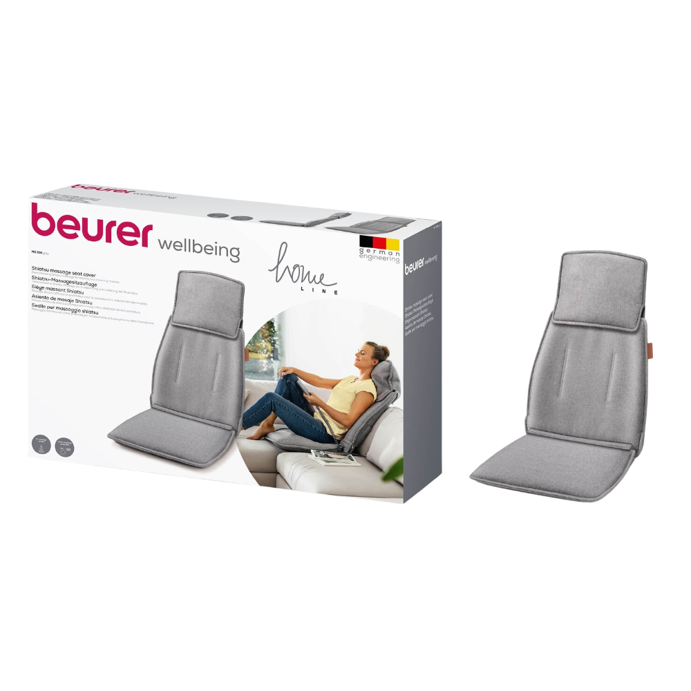 Bilden visar ett blått Shiatsu-massagesitsöverdrag Beurer MG 330. Produkten visas både som en fysisk produkt och på förpackningen som visar en bild av en person som använder sitsöverdraget, varumärket för Beurer GmbH och detaljer om dess 4-huvudiga massagesystem med justerbart nackområde.