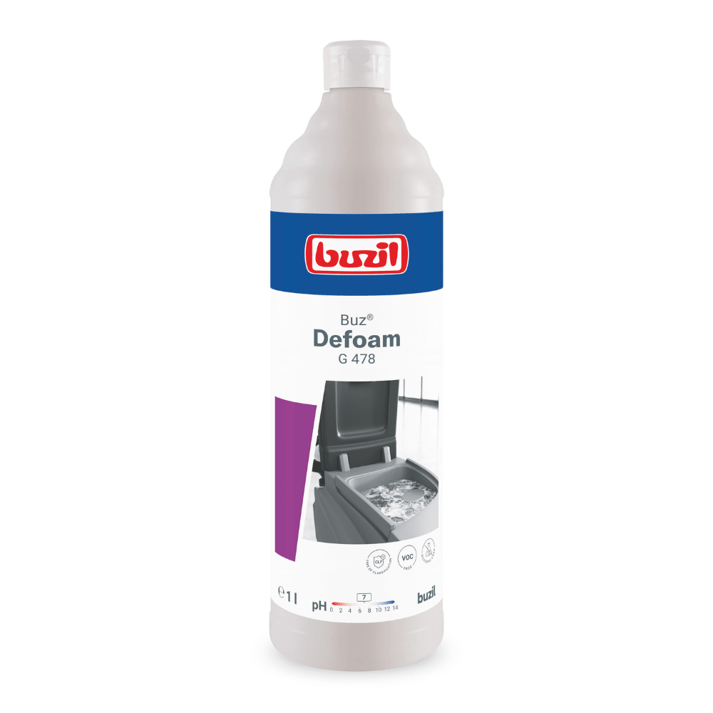 En flaska Buzil Buz® Defoam G 478, ett skumdämpande medel för maskiner tillverkat av BUZIL-WERK Wagner GmbH & Co. KG, har en vit etikett med ett blått och rött varumärke. Flaskan har utvecklats för skumdämpning och visar en bild av skum på en yta som ska behandlas. Med en volym på 1 liter är den idealisk för att minska skumbildningen i olika rengöringsmaskiner.