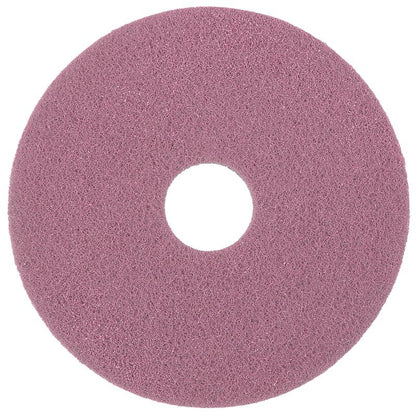 Das Diversey Twister Pad Pink für Vinylböden von Diversey Deutschland GmbH & Co. OHG ist ein rundes, flaches, rosafarbenes Reinigungspad mit grober Textur und zentralem Loch, das von oben auf weißem Hintergrund zu sehen ist.