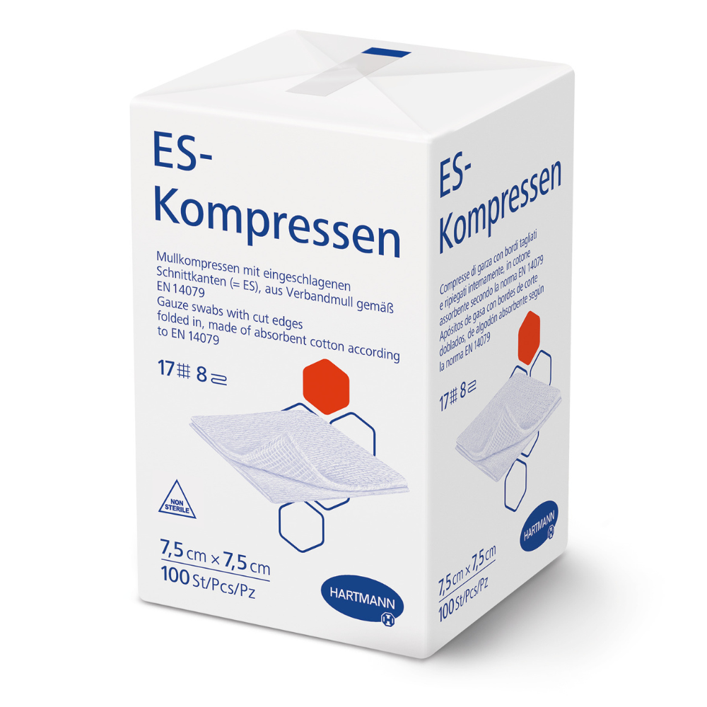 Eine weiße Schachtel mit der Aufschrift "Hartmann ES-Kompressen verschiedene Größen, unsteril" der Paul Hartmann AG zeigt eine Produktinformation in deutscher Sprache, die Maße 7,5 x 7,5 cm, 100 Stück, eine Abbildung von Mullkompressen für die Wundversorgung und das Hartmann-Logo am Boden.