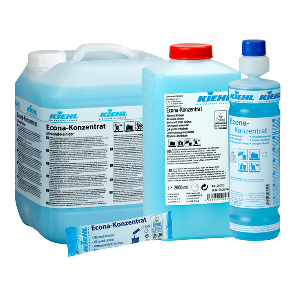 Avbildade är fyra förpackningar av Kiehl Econa-koncentrat Allround-rengöring från Johannes Kiehl KG i olika storlekar: en stor kanna, medelstora och små flaskor samt en engångspåse, alla med vit-blå etiketter.