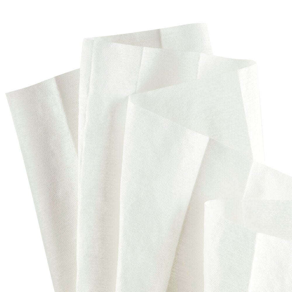 Flera WypAll® X60 General Clean dukar från Kimberly-Clark GmbH är utspridda på vit bakgrund och betonar användningen för rengöring och komforten hos storarullen med 650 dukar per rulle.