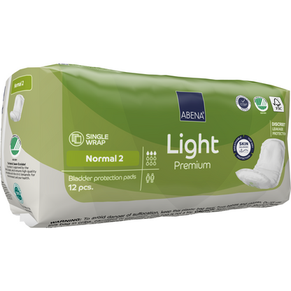 Eine grüne Packung ABENA Light Normal 2, Premium von Abena Re-Seller GmbH enthält 12 Binden. Die Verpackung enthält Angaben zur Saugfähigkeit, die wichtigsten Produktvorteile und Symbole für Hautfreundlichkeit und diskreten Schutz.