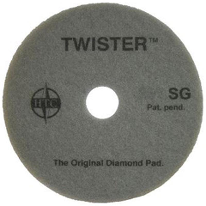 Twister Pad 10000 från Diversey Deutschland GmbH & Co. OHG är en rund, grå pad med centralt hål, perfekt för rengöring och polering av hårda golv.